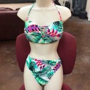 Tropical bikini set, size 15-17. Never worn, new. Top has padding.